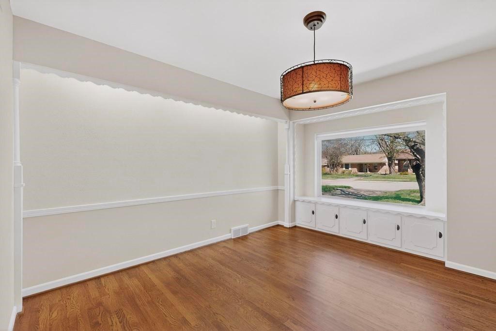 2120 Healey Drive Dallas, TX 75228 - Photo 9 of 39 a view of an empty room with a window