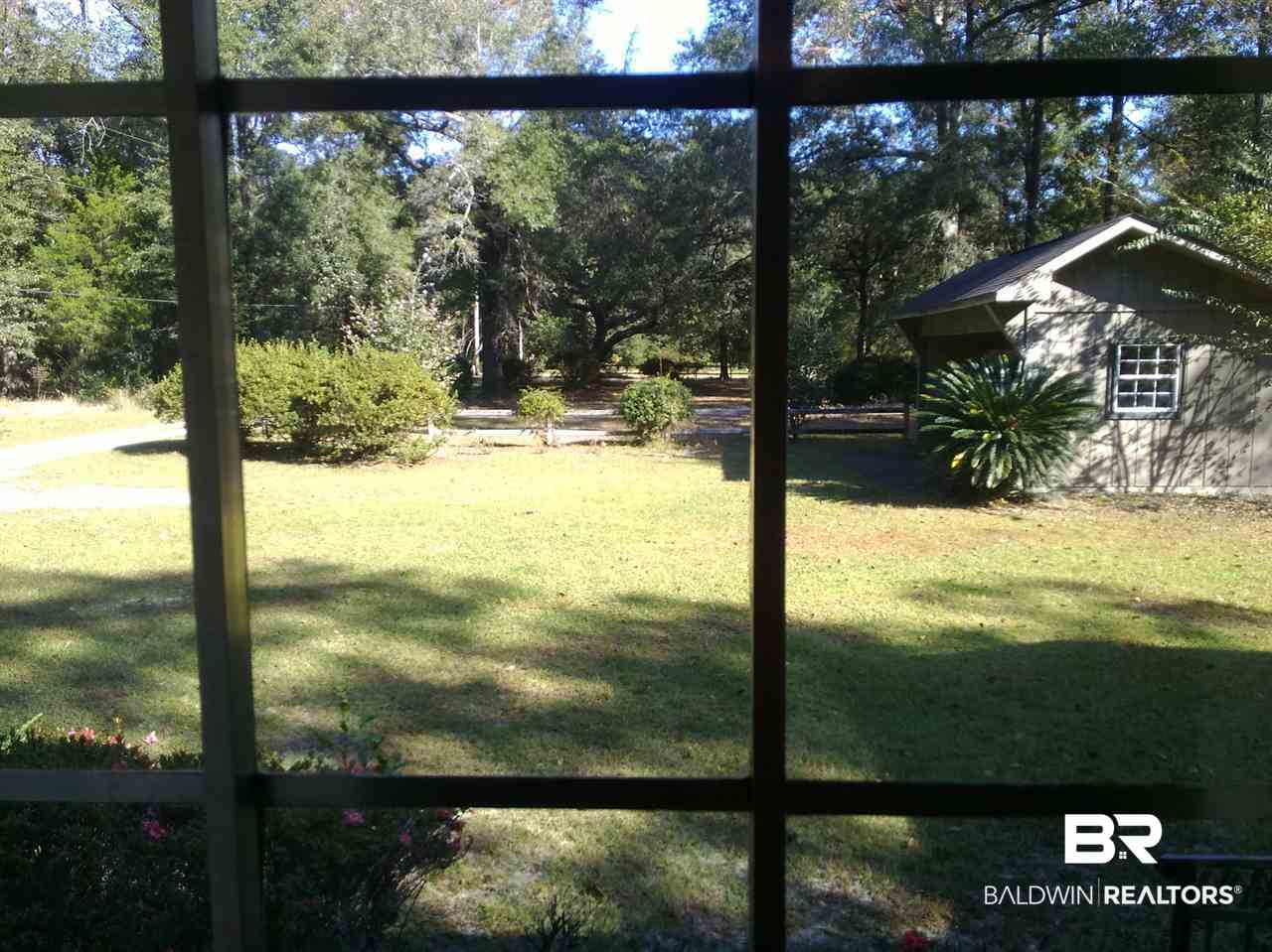 8189 River Road North Foley, AL 36535 - Photo 17 of 50 Formal dining room view.
