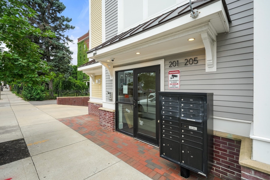205 E Street, Unit 8N Boston, MA 02127 - Photo 20 of 29 a view of a entryway door front of house