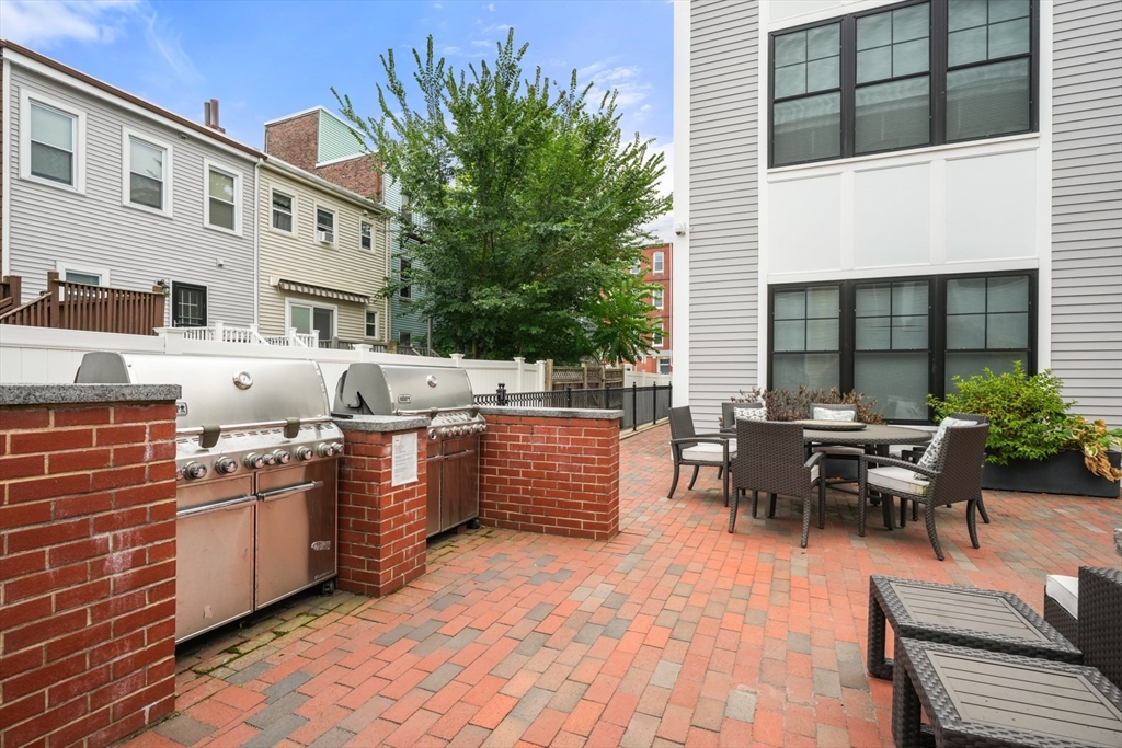 205 E Street, Unit 8N Boston, MA 02127 - Photo 24 of 29 a view of outdoor sitting area with furniture