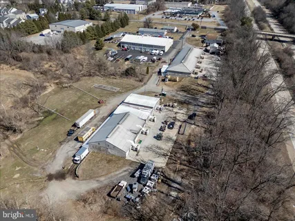 an aerial view of a houses with outdoor space