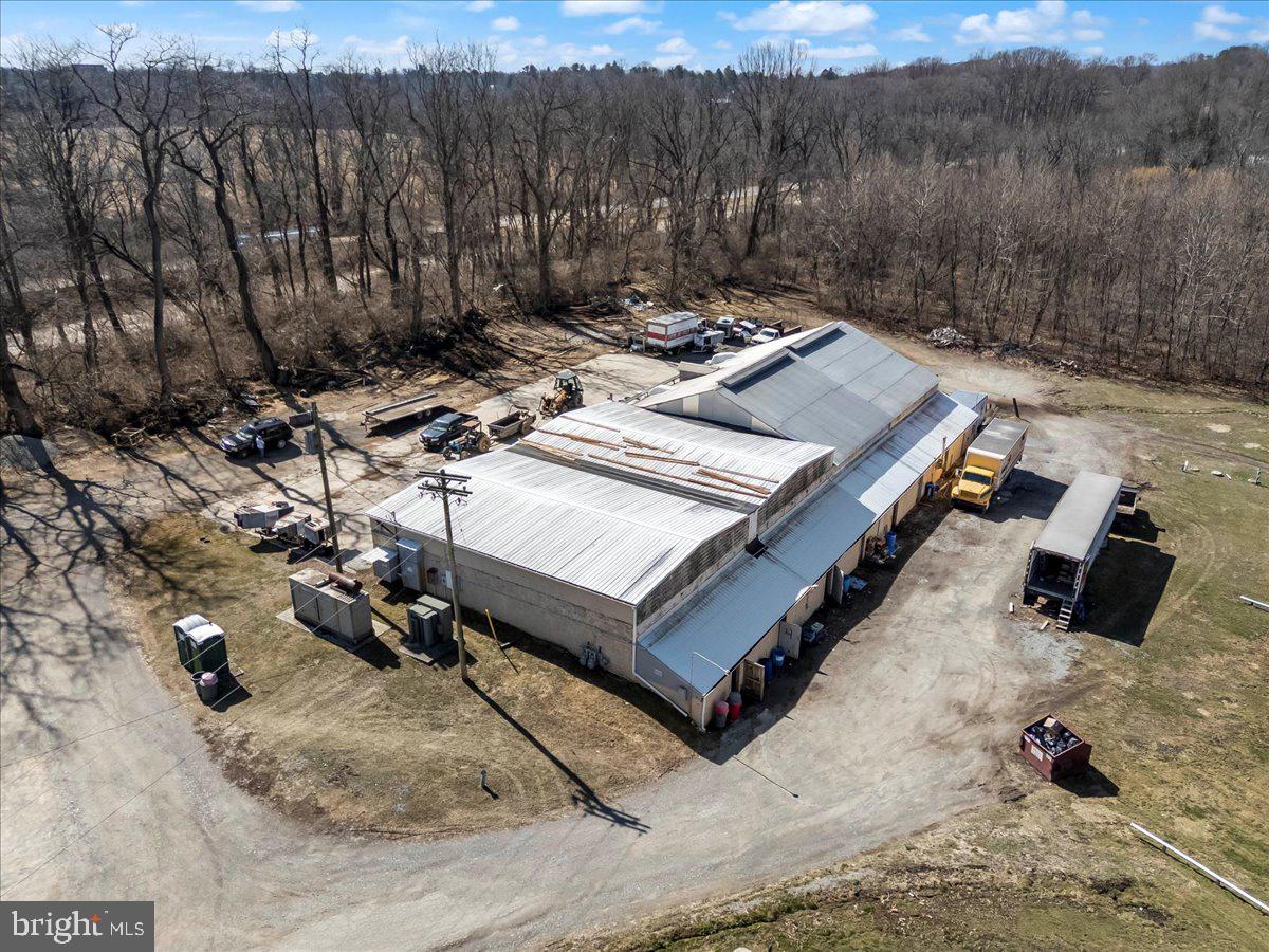 501 North Walnut Road Kennett Square, PA 19348 - Photo 7 of 23 a view of a backyard with furniture and a rug