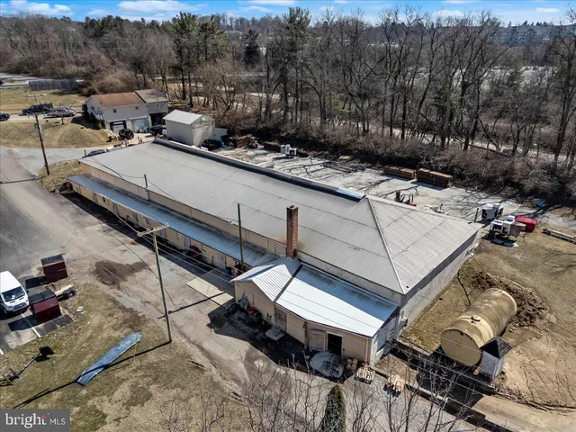 a view of a backyard with sitting area