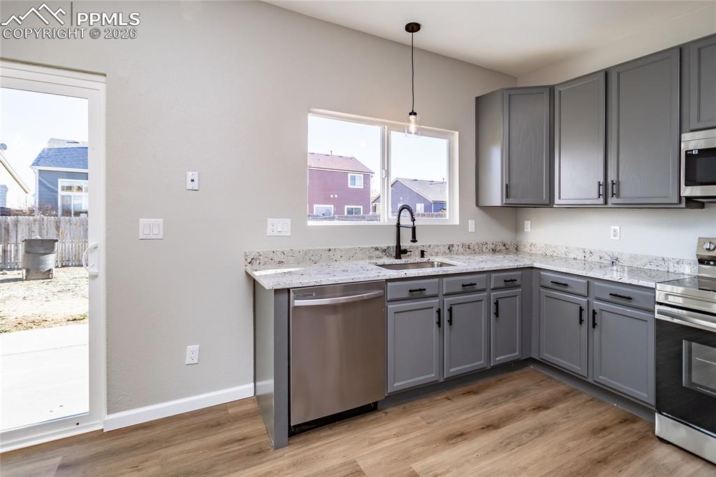 890 Rancher Drive Fountain, CO 80817 - Photo 17 of 42 the dining area walks out to the large new patio.