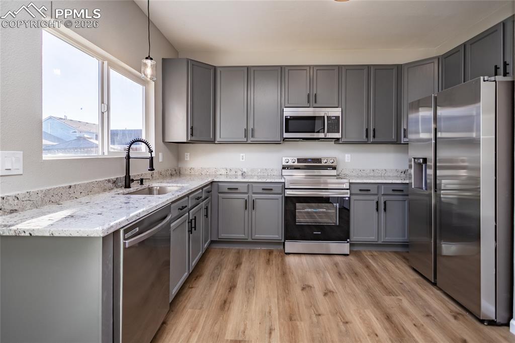890 Rancher Drive Fountain, CO 80817 - Photo 19 of 42 Check out the abundant counter and cabinet space!