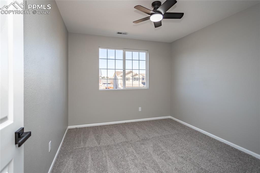 890 Rancher Drive Fountain, CO 80817 - Photo 23 of 42 All new secondary bedroom