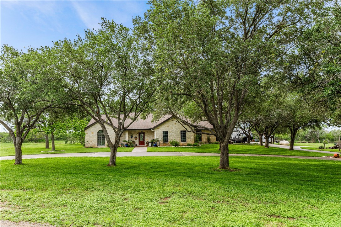 345 Trail Ridge Drive Sandia, TX 78383 - Photo 8 of 40 a house view with trees