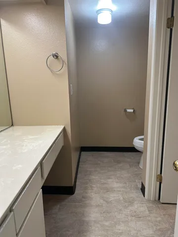 a bathroom with a tub and a shower