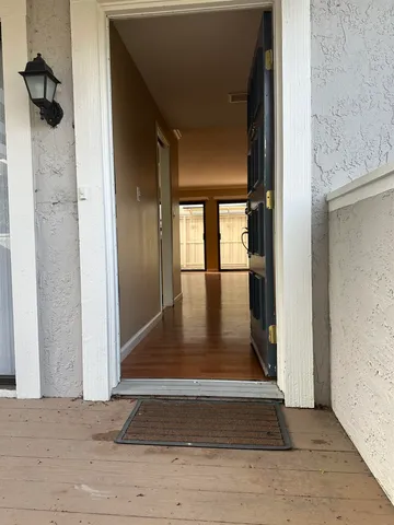 a view of a hallway view with staircase