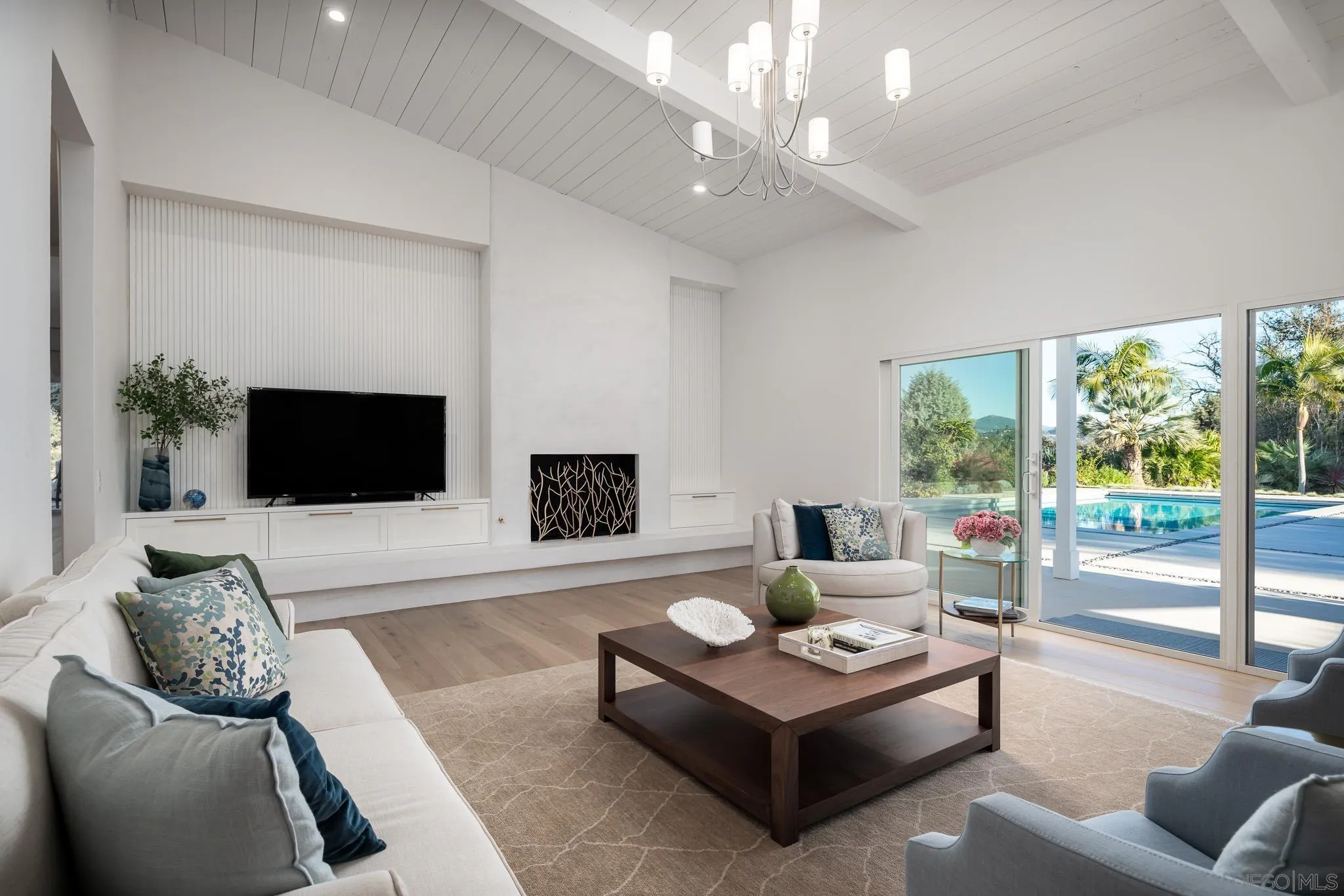 16039 Via Del Alba Rancho Santa Fe, CA 92067 - Photo 17 of 56 a living room with furniture and a flat screen tv