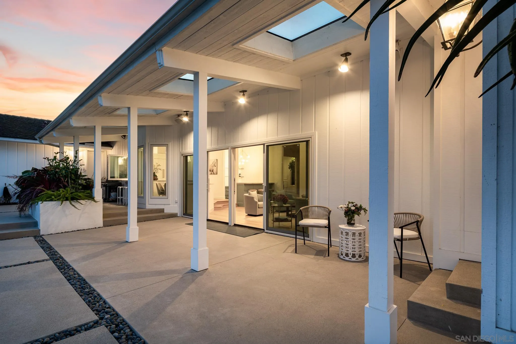 16039 Via Del Alba Rancho Santa Fe, CA 92067 - Photo 22 of 56 a building outdoor space with patio furniture and potted plants