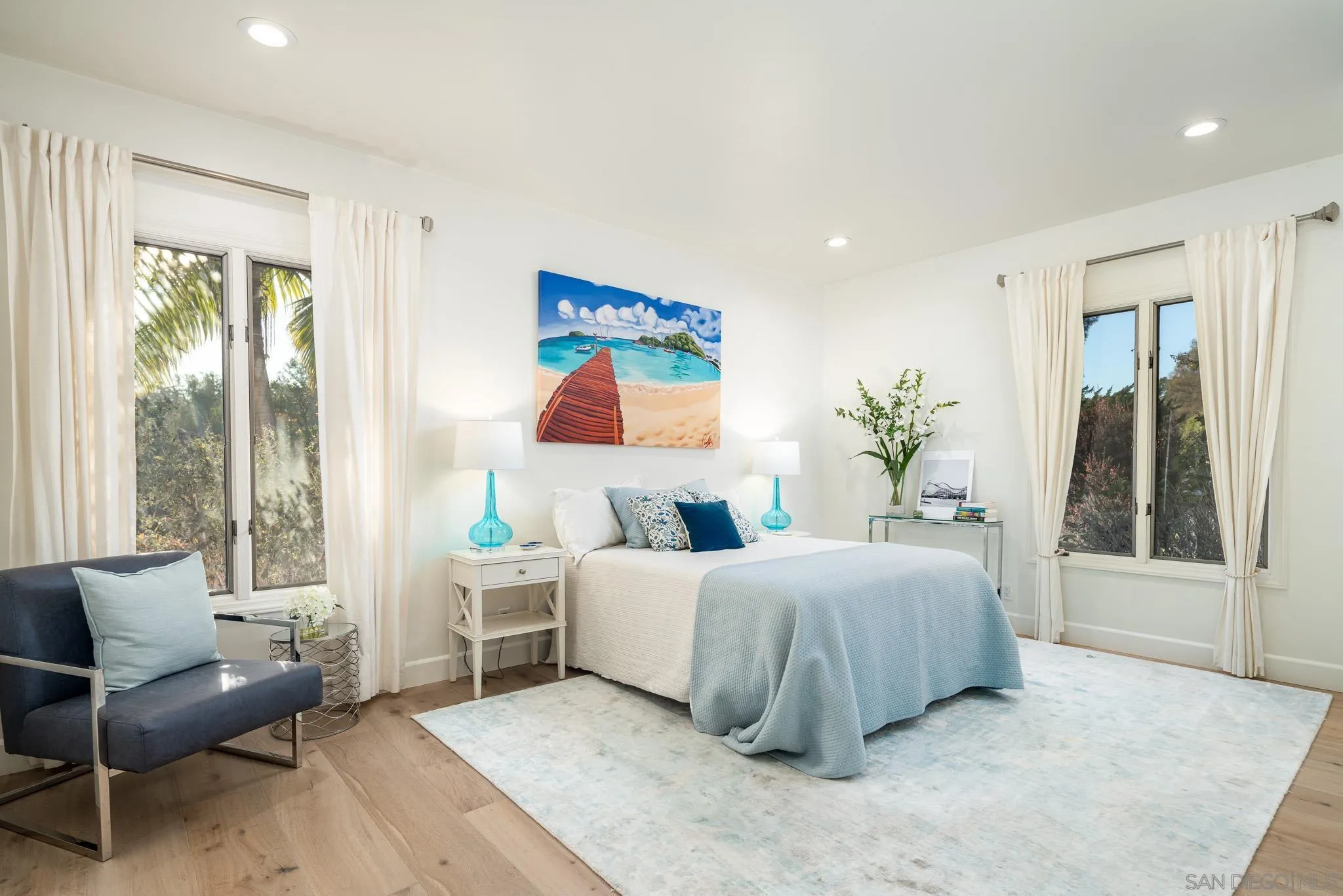 16039 Via Del Alba Rancho Santa Fe, CA 92067 - Photo 33 of 56 a living room with a bed furniture and a large window