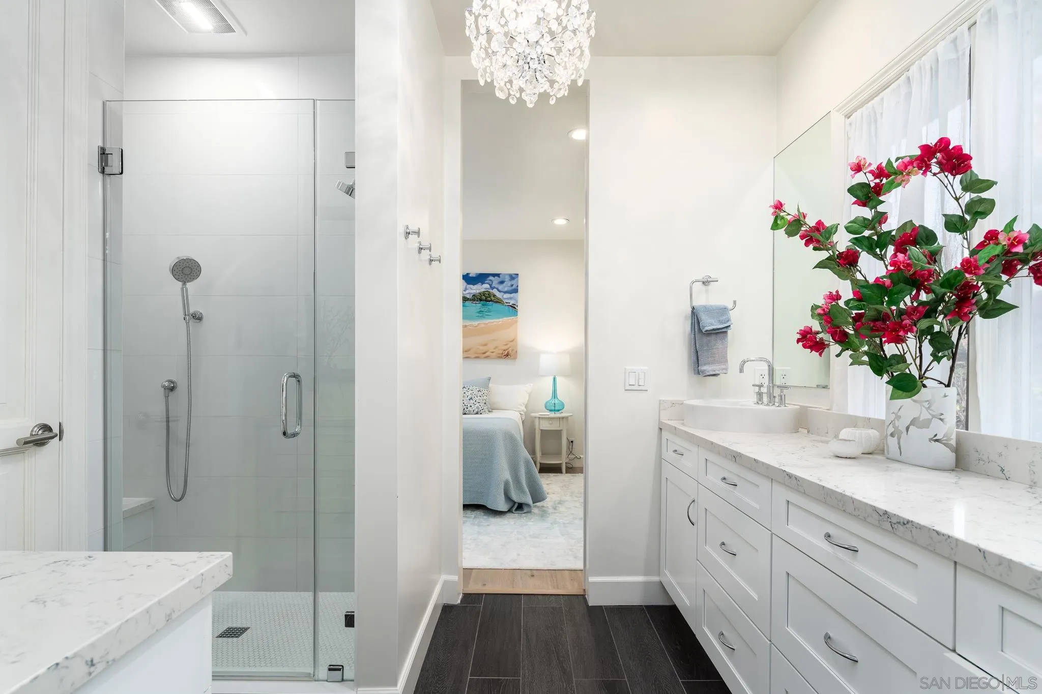 16039 Via Del Alba Rancho Santa Fe, CA 92067 - Photo 34 of 56 a bathroom with a double vanity sink mirror and shower