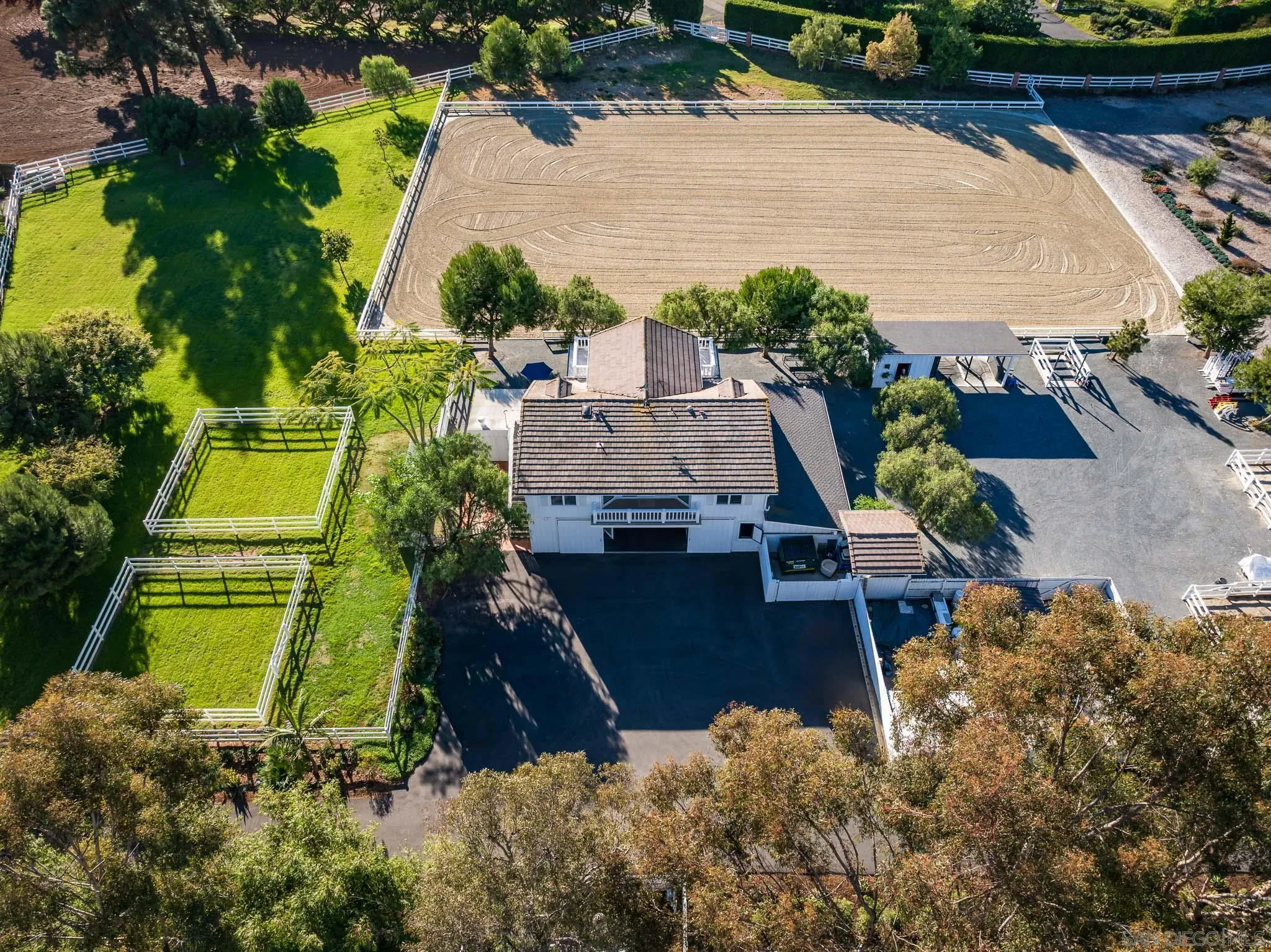 16039 Via Del Alba Rancho Santa Fe, CA 92067 - Photo 36 of 56 an aerial view of a house with a garden and lake view