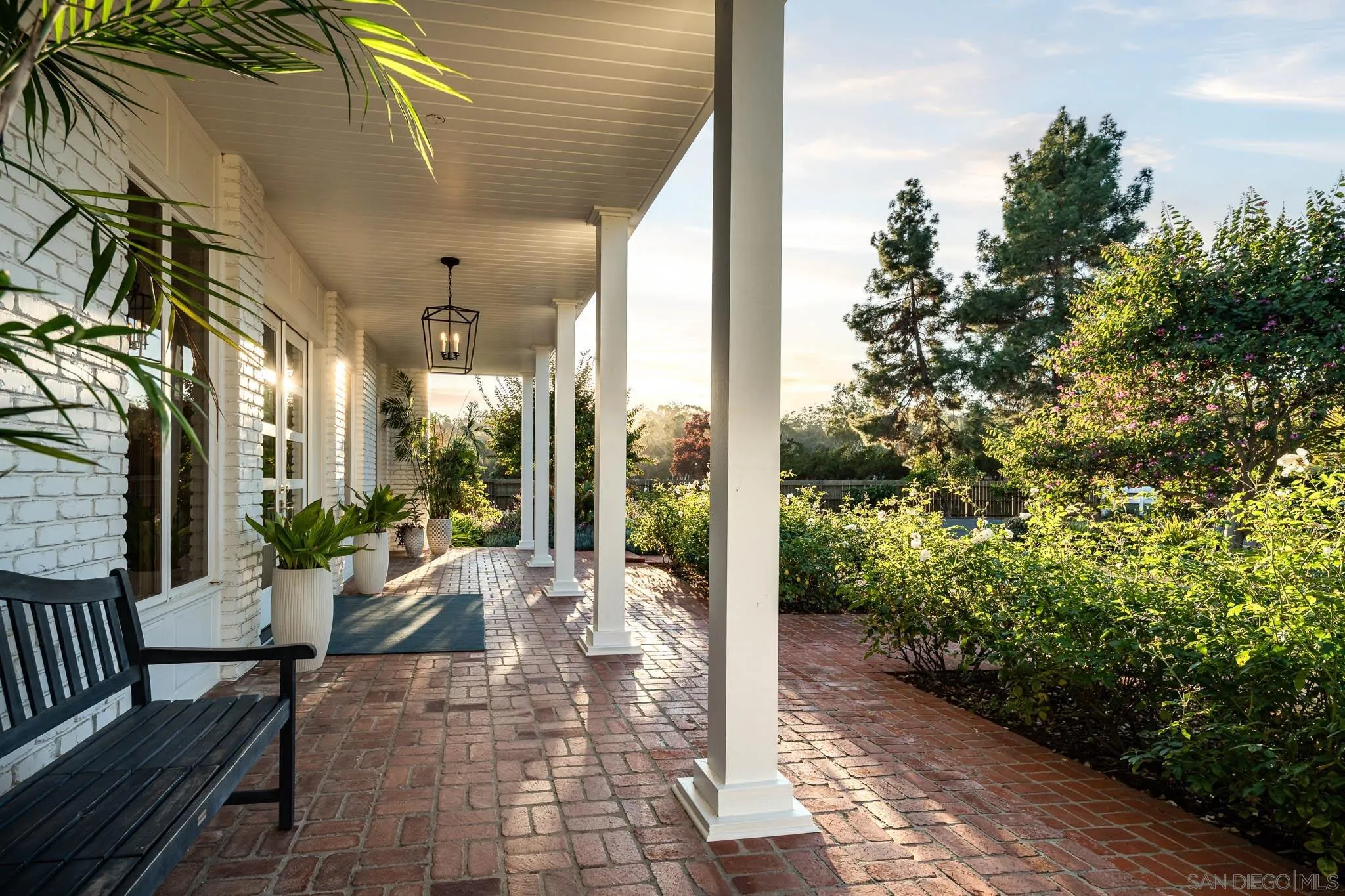 16039 Via Del Alba Rancho Santa Fe, CA 92067 - Photo 4 of 56 a view of a porch with chairs and backyard