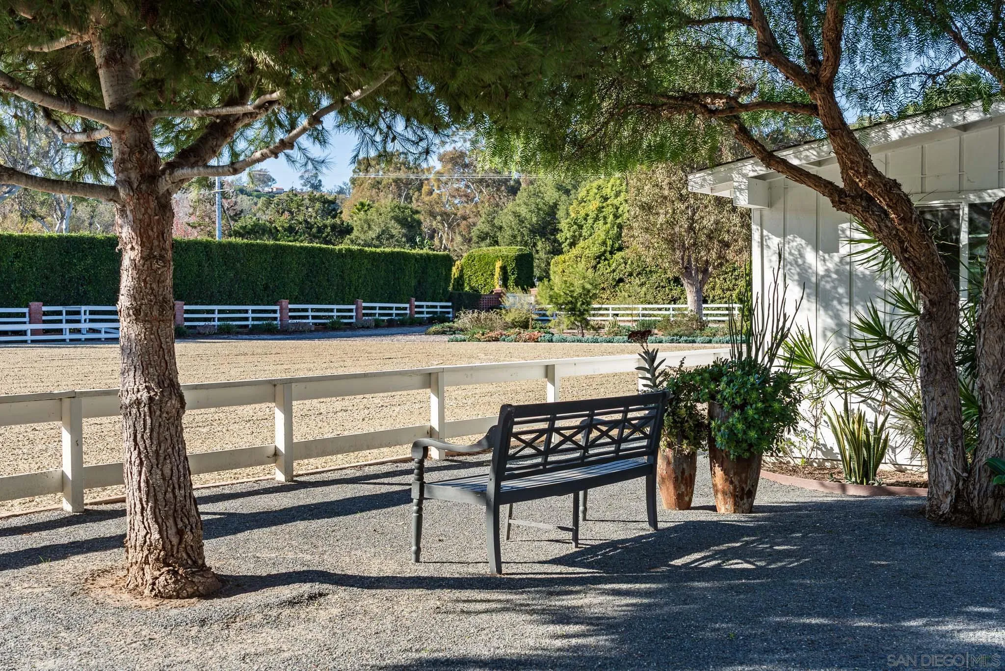 16039 Via Del Alba Rancho Santa Fe, CA 92067 - Photo 45 of 56 a view of a bench in a yard