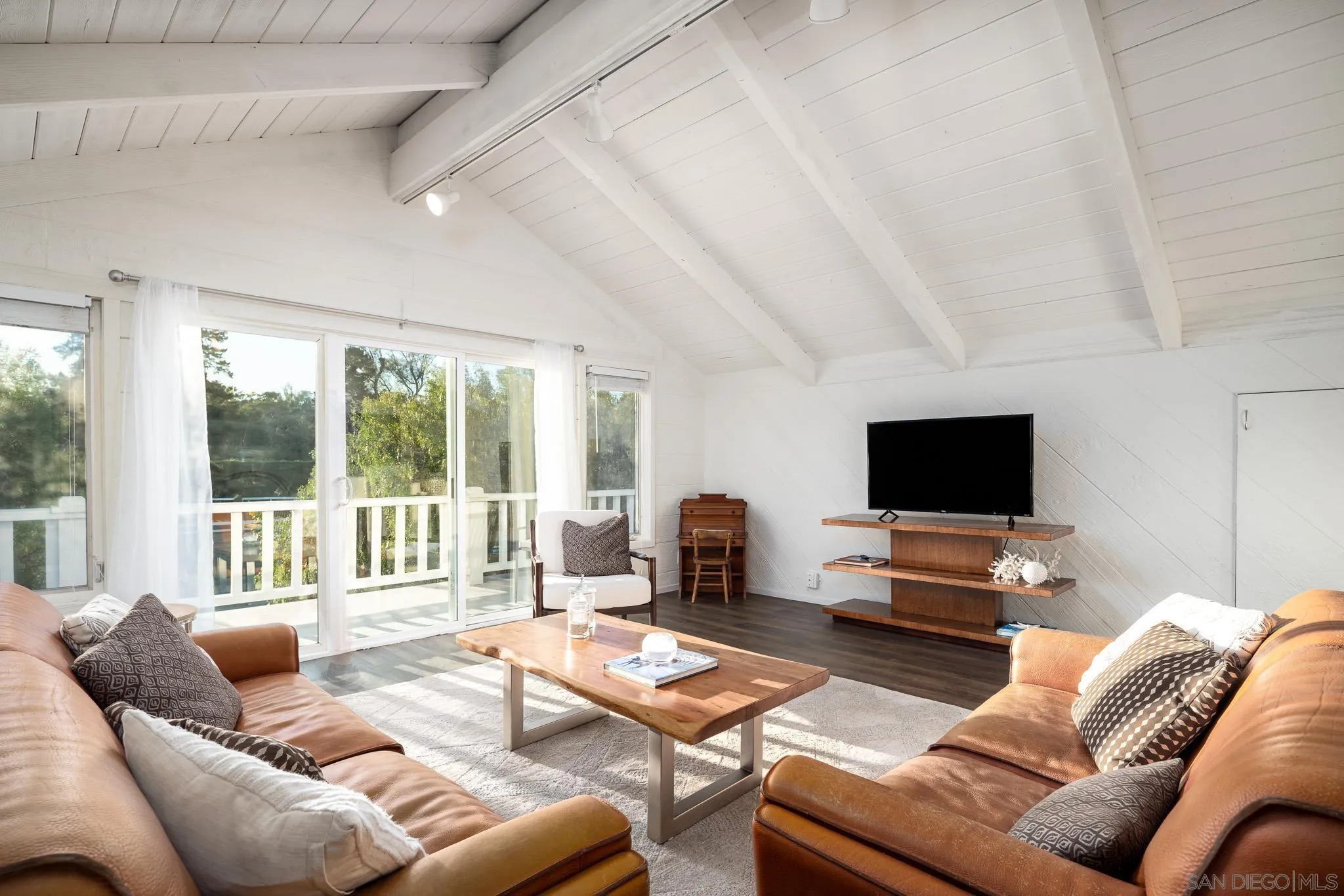 16039 Via Del Alba Rancho Santa Fe, CA 92067 - Photo 48 of 56 a living room with furniture and a flat screen tv