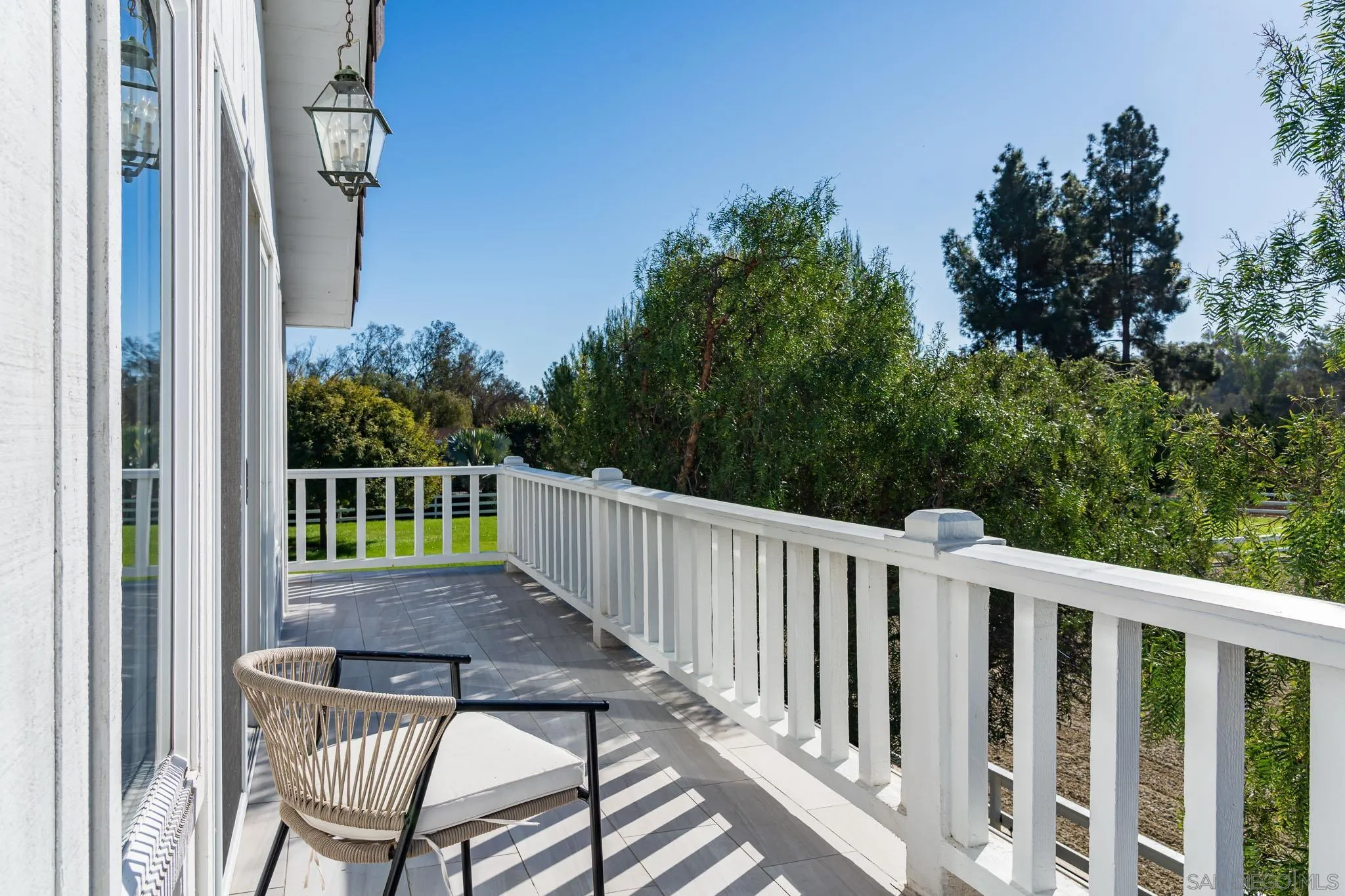 16039 Via Del Alba Rancho Santa Fe, CA 92067 - Photo 51 of 56 a view of a chair and table in the balcony