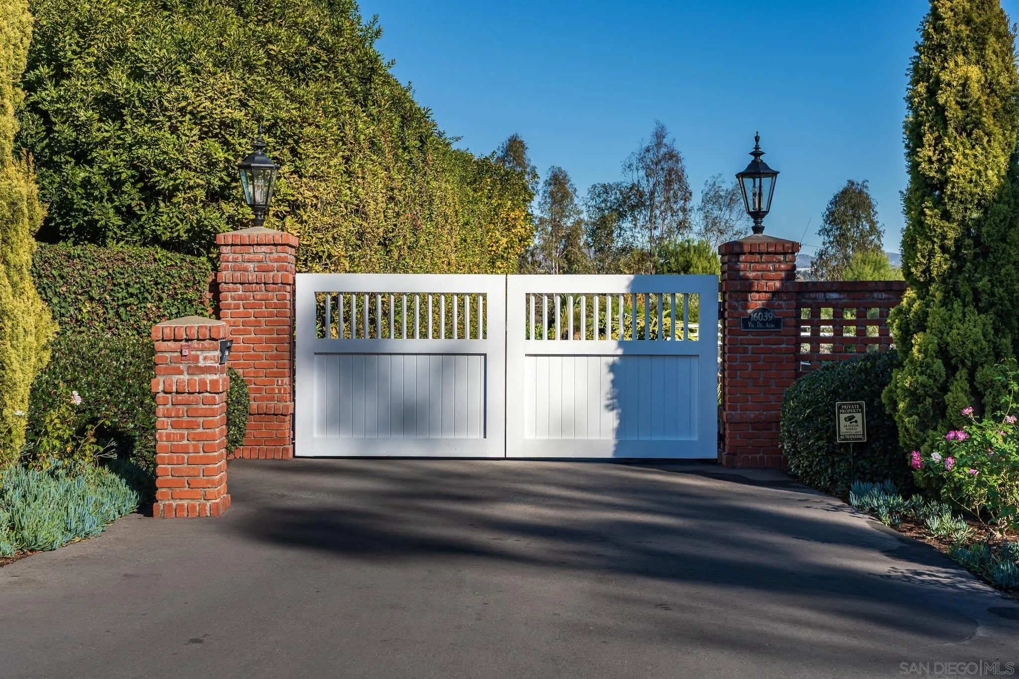 16039 Via Del Alba Rancho Santa Fe, CA 92067 - Photo 56 of 56 a view of a porch with a bench