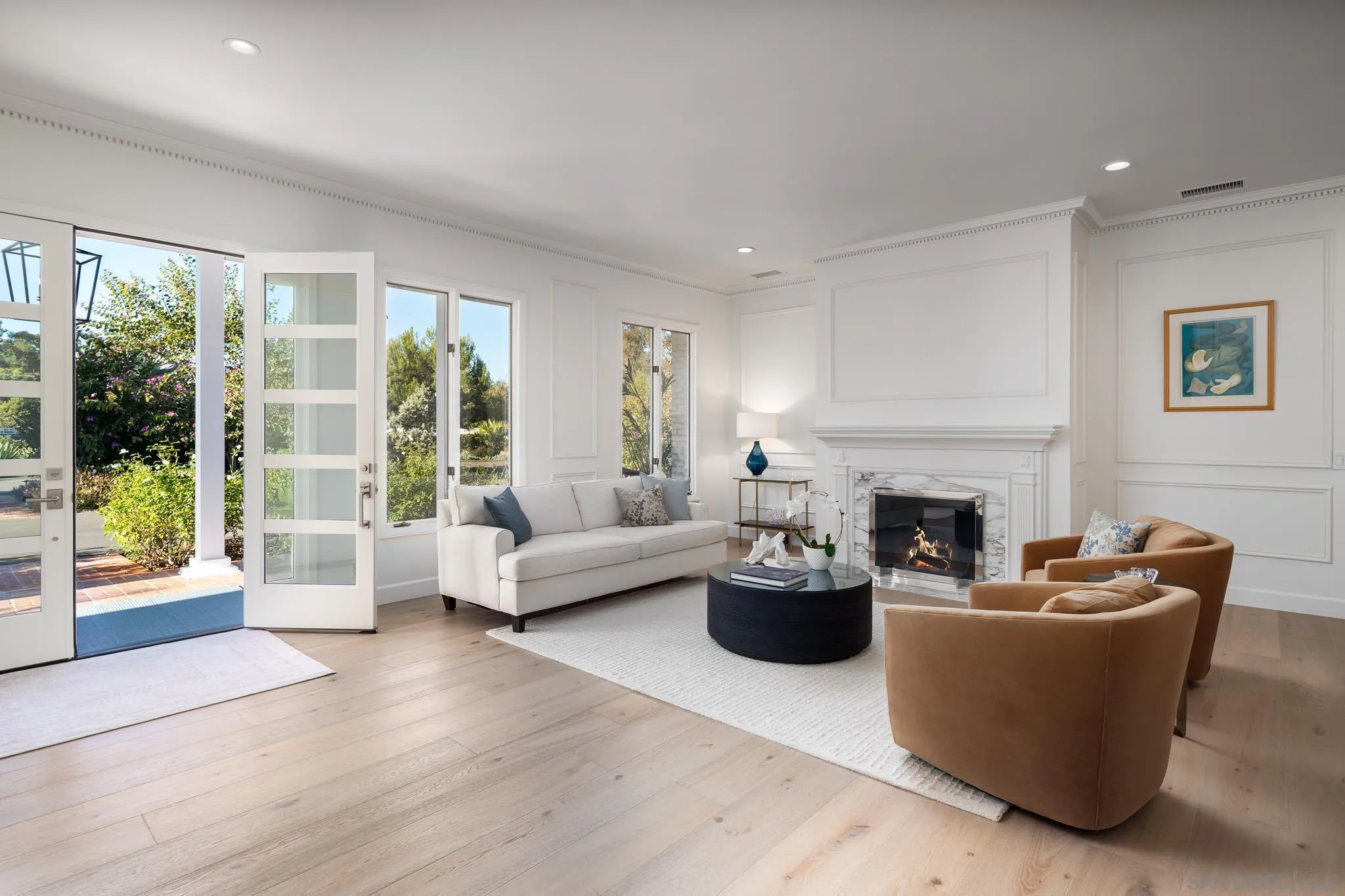 16039 Via Del Alba Rancho Santa Fe, CA 92067 - Photo 6 of 56 a living room with furniture and a fireplace