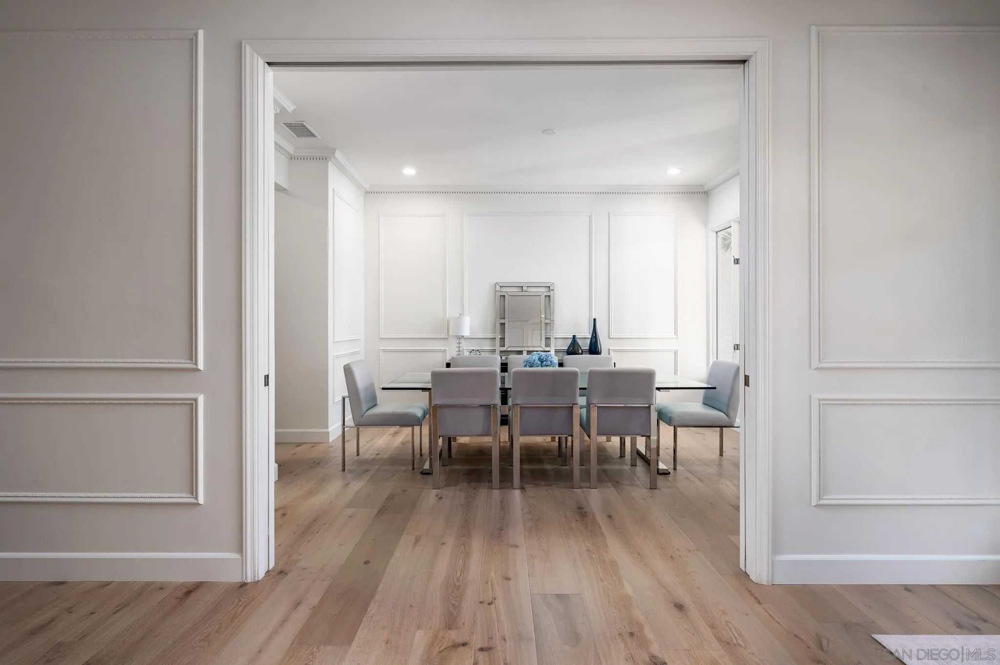 16039 Via Del Alba Rancho Santa Fe, CA 92067 - Photo 9 of 56 a view of a dining room with furniture and wooden floor
