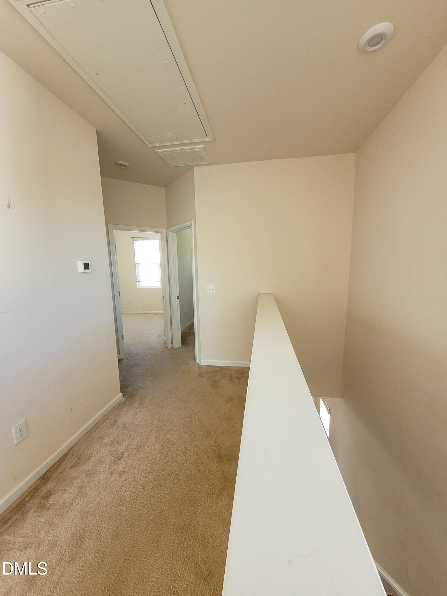 8951 Commons Townes Drive Raleigh, NC 27616 - Photo 24 of 40 a view of a big room with closet and windows