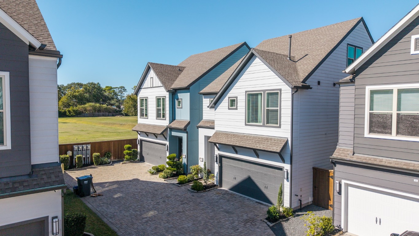 968 Ford Pines Lane Houston, TX 77091 - Photo 28 of 34 a front view of a house with a yard