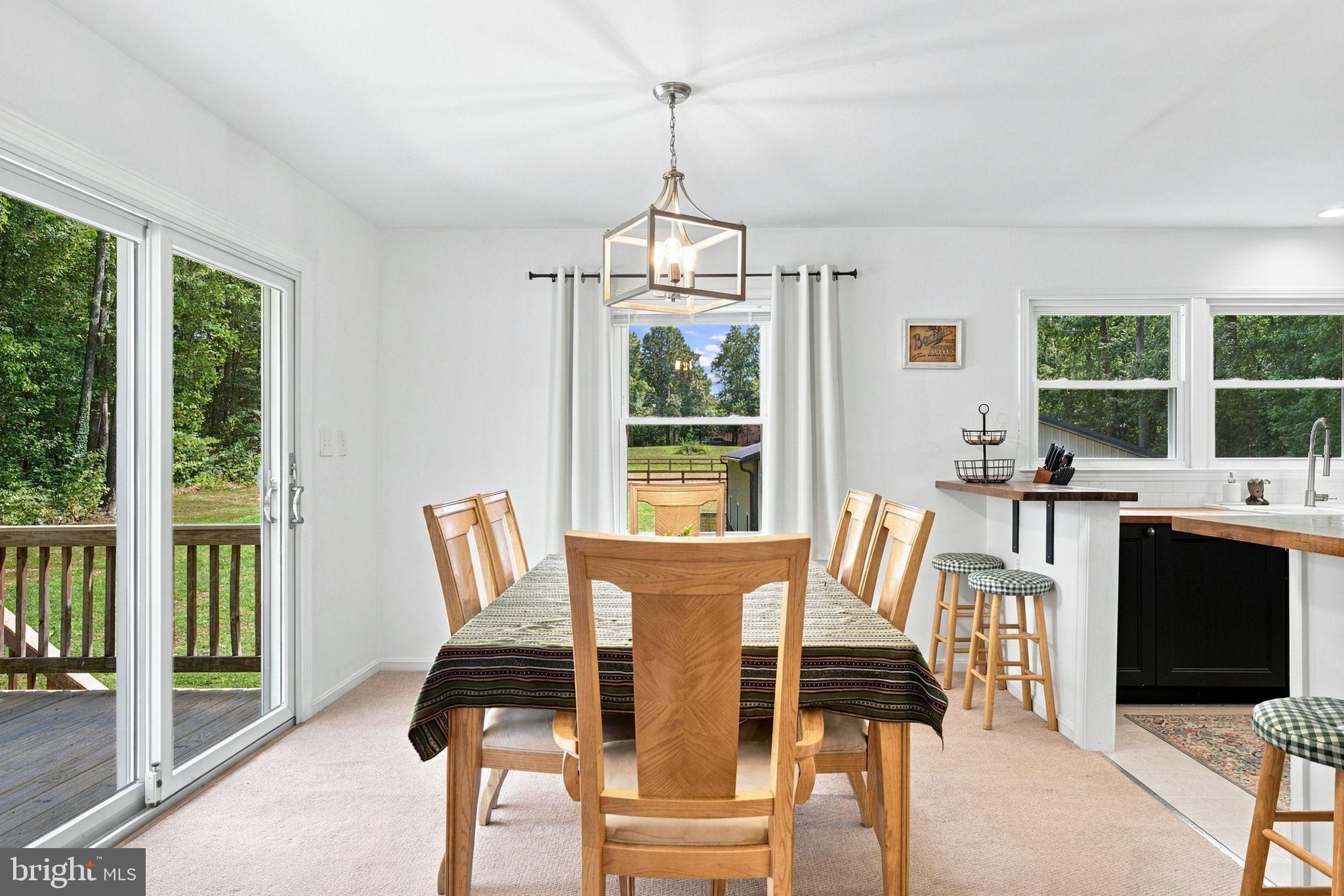 5483 Beach Road Midland, VA 22728 - Photo 19 of 78 Dining Room with Sliding Glass Door to Deck