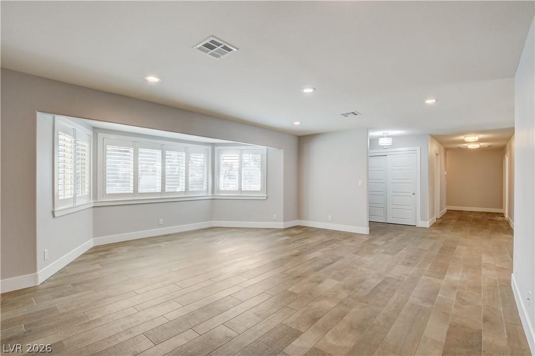 4207 Ridgecrest Drive Las Vegas, NV 89121 - Photo 12 of 27 Living room showed from the other side of this large room!