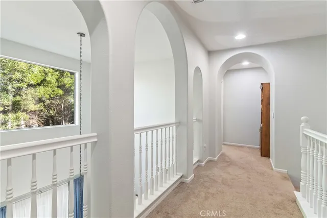 a bathroom with double sink and a mirror
