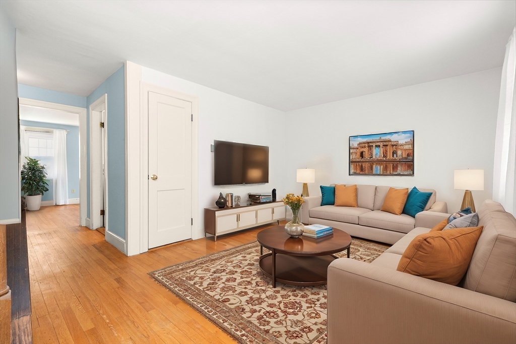 31 A Centre Street Danvers, MA 01923 - Photo 12 of 42 a living room with furniture and a flat screen tv