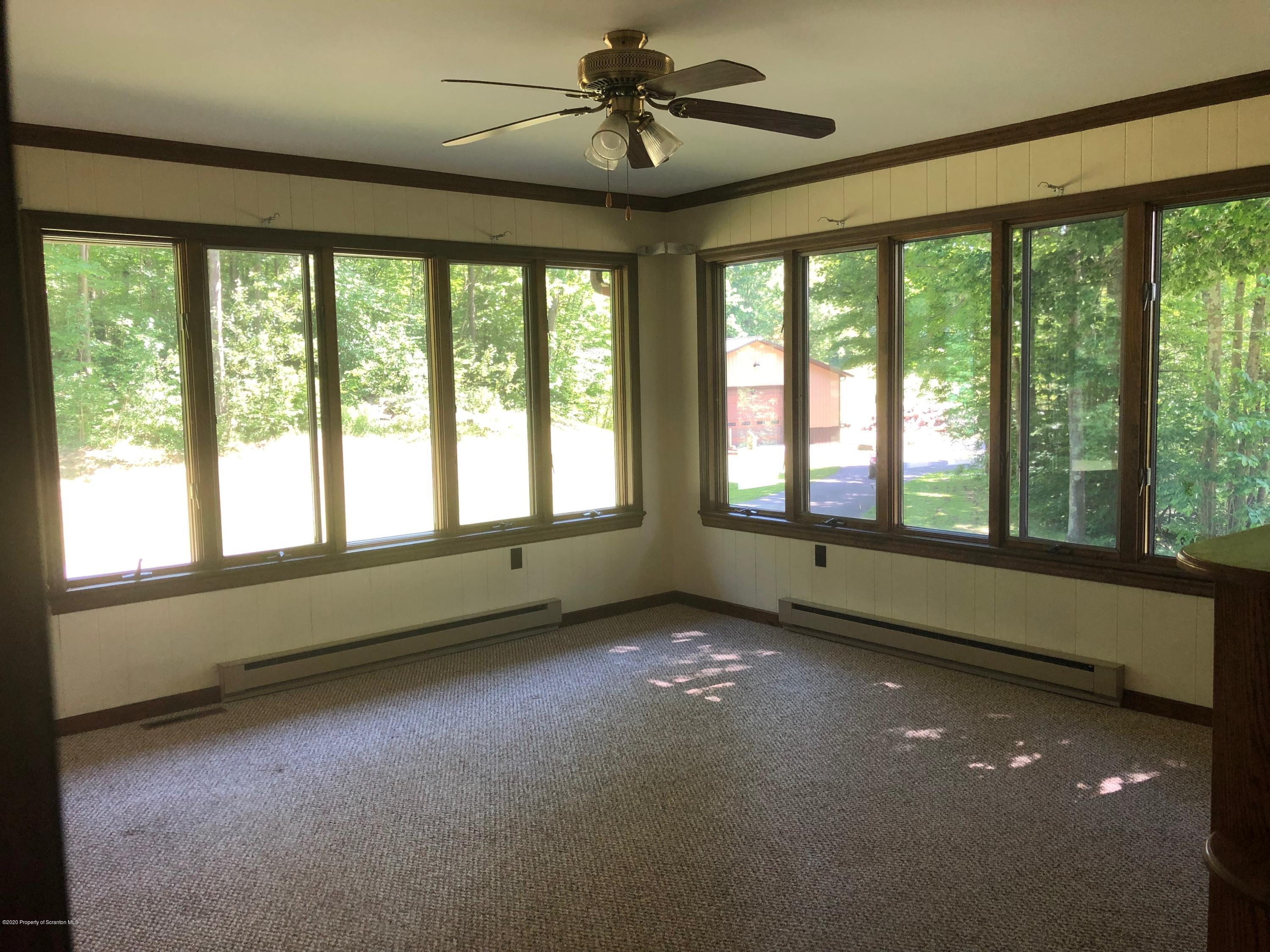 4262 Hamlin Highway Moscow, PA 18444 - Photo 5 of 13 a view of an empty room with a window