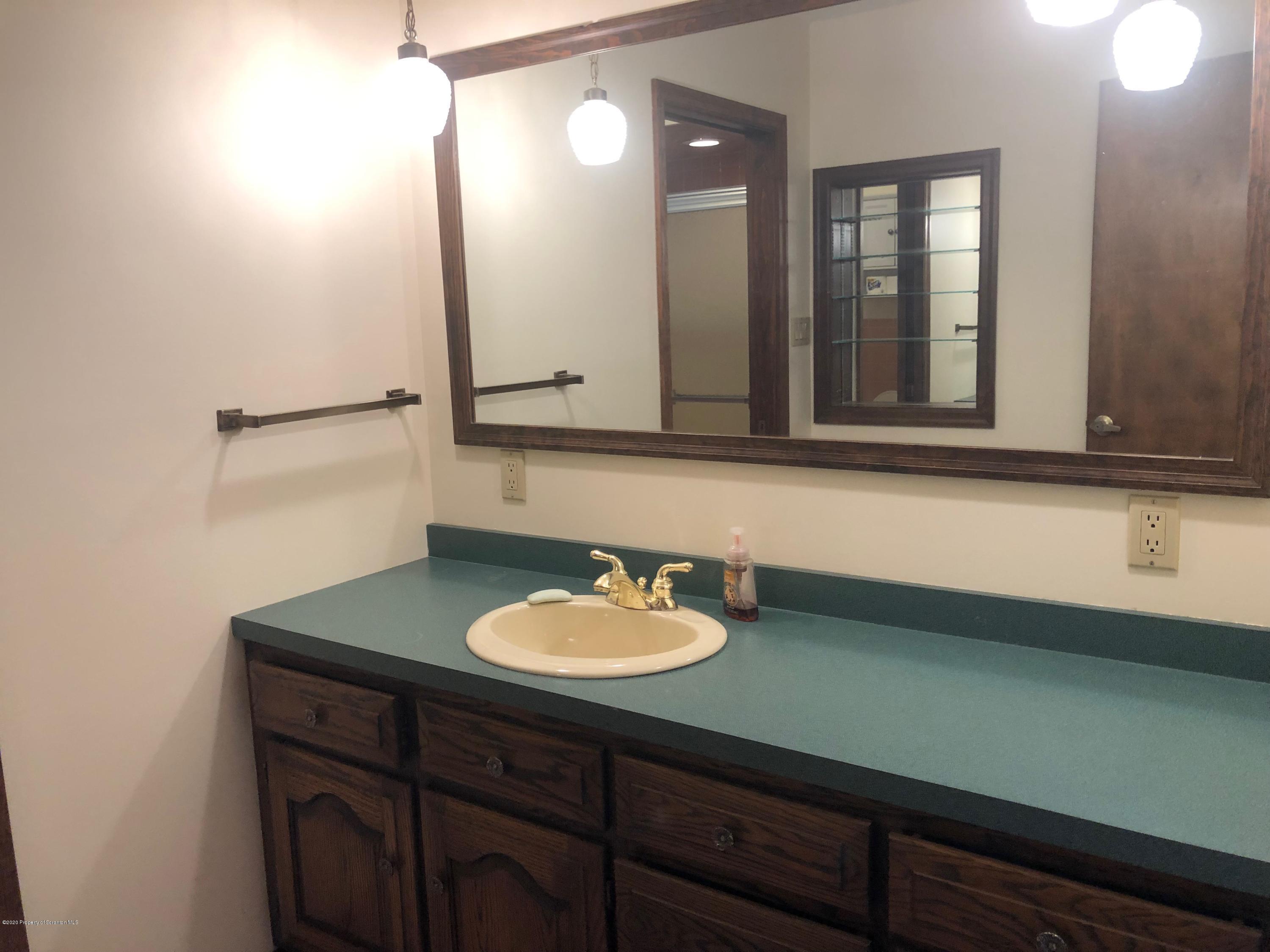 4262 Hamlin Highway Moscow, PA 18444 - Photo 10 of 13 a bathroom with a sink and a mirror