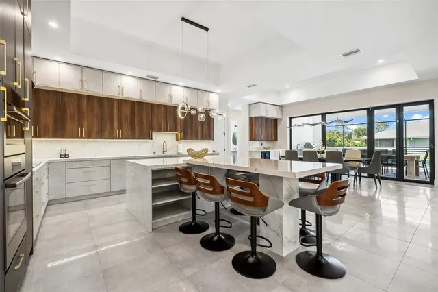 a kitchen with counter space cabinets and appliances