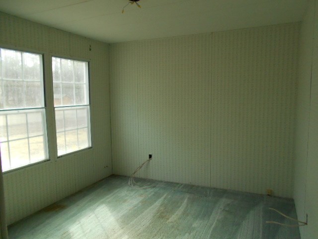 5654 Fulton Mill Road Lizella, GA 31052 - Photo 12 of 12 an empty room with a window