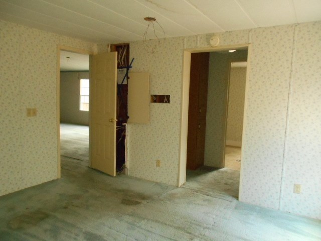 5654 Fulton Mill Road Lizella, GA 31052 - Photo 8 of 12 an empty room with an entryway door