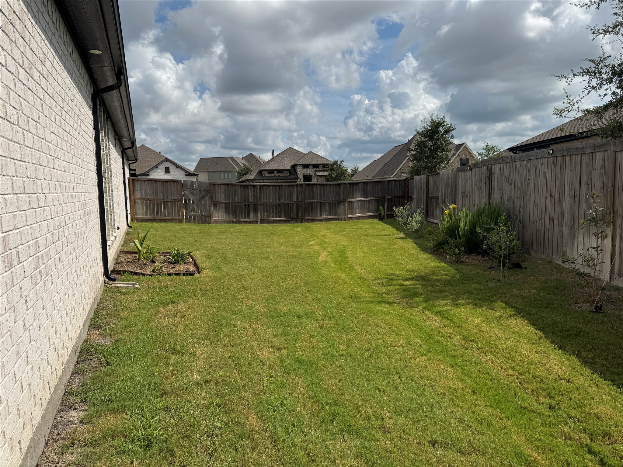 4522 Peloton Road Rosharon, TX 77583 - Photo 18 of 19 a view of a backyard