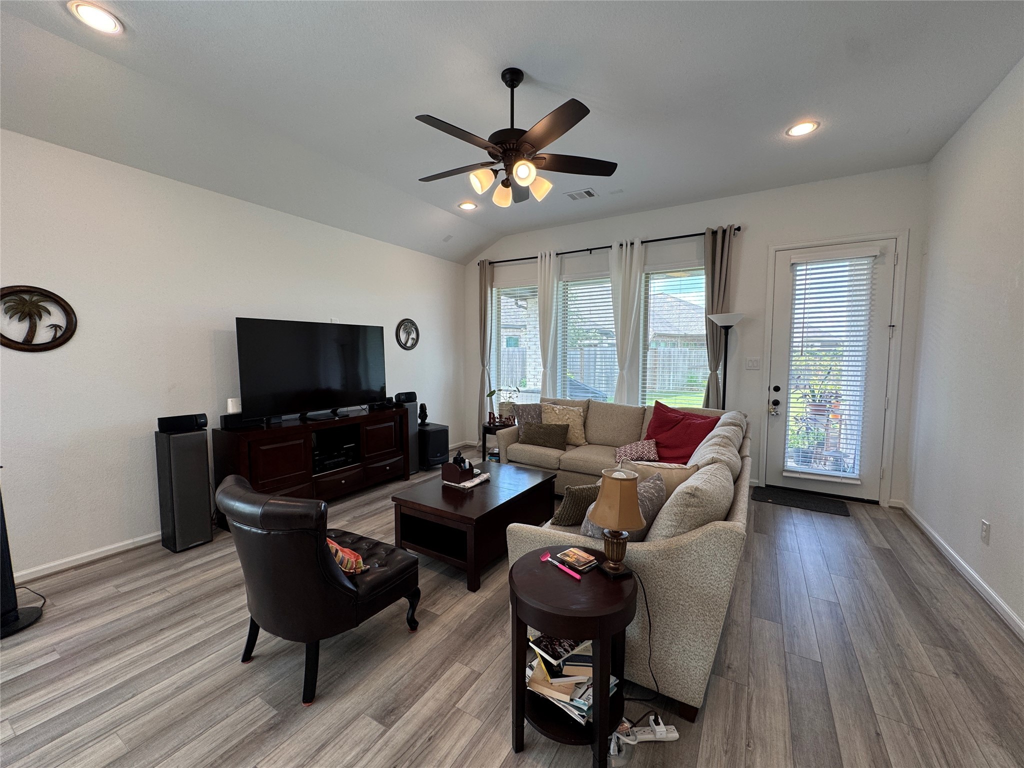 4522 Peloton Road Rosharon, TX 77583 - Photo 9 of 19 a living room with furniture and a flat screen tv