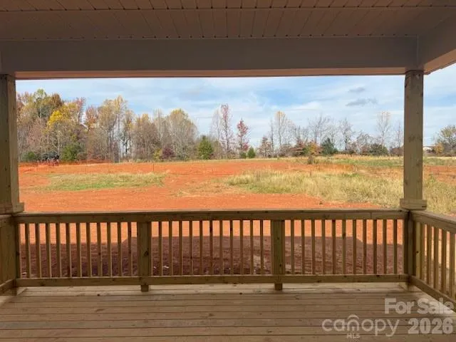 a view of a lake from a balcony