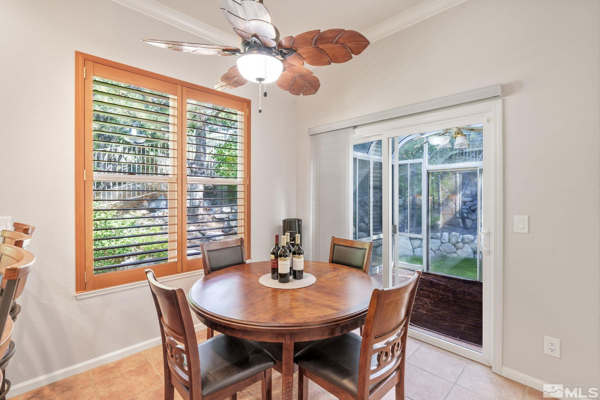 3950 Plateau Road Reno, NV 89519 - Photo 14 of 37 a view of a dining room with furniture window and outside view
