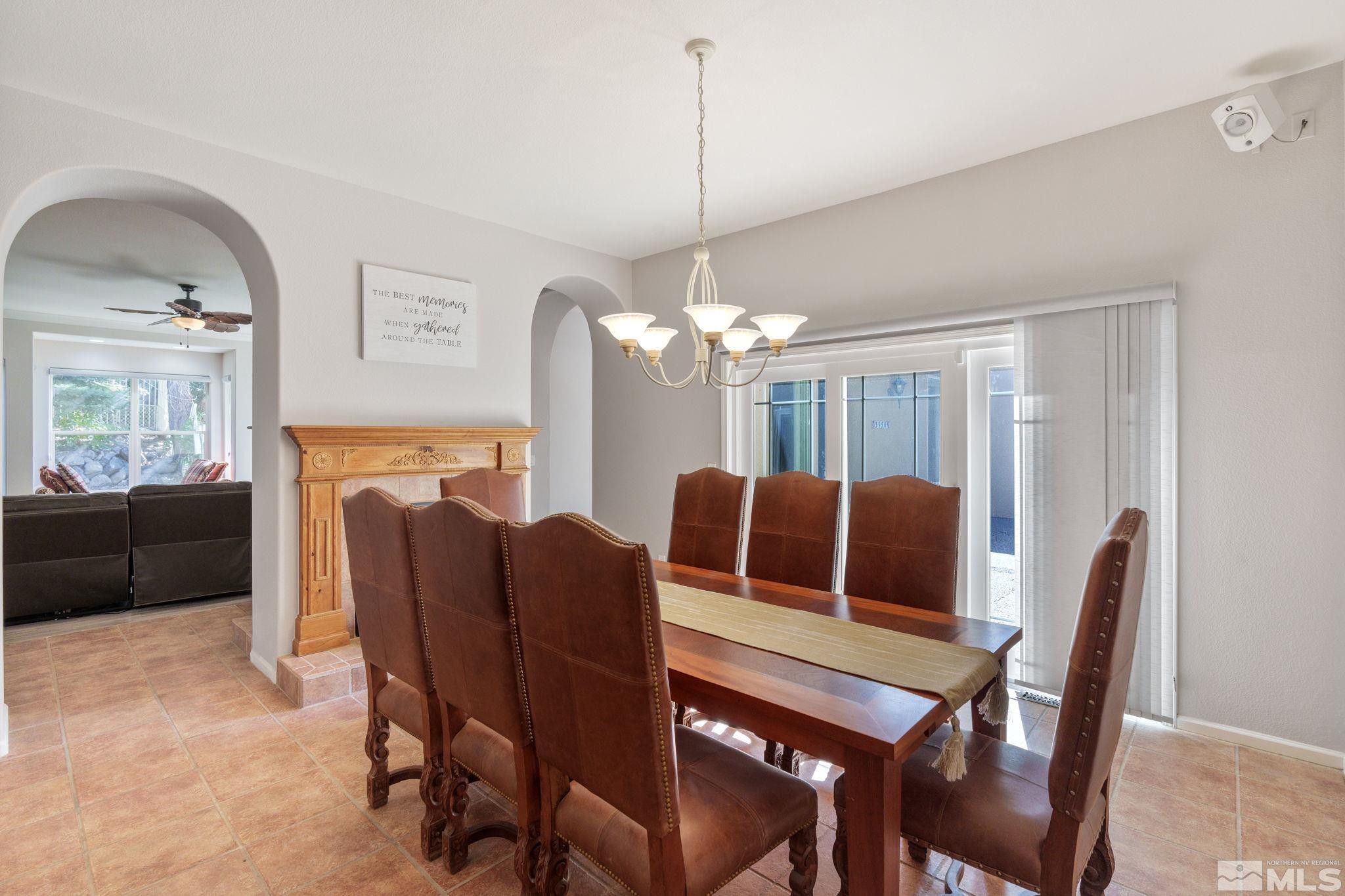 3950 Plateau Road Reno, NV 89519 - Photo 17 of 37 a view of a dining room with furniture window and wooden floor