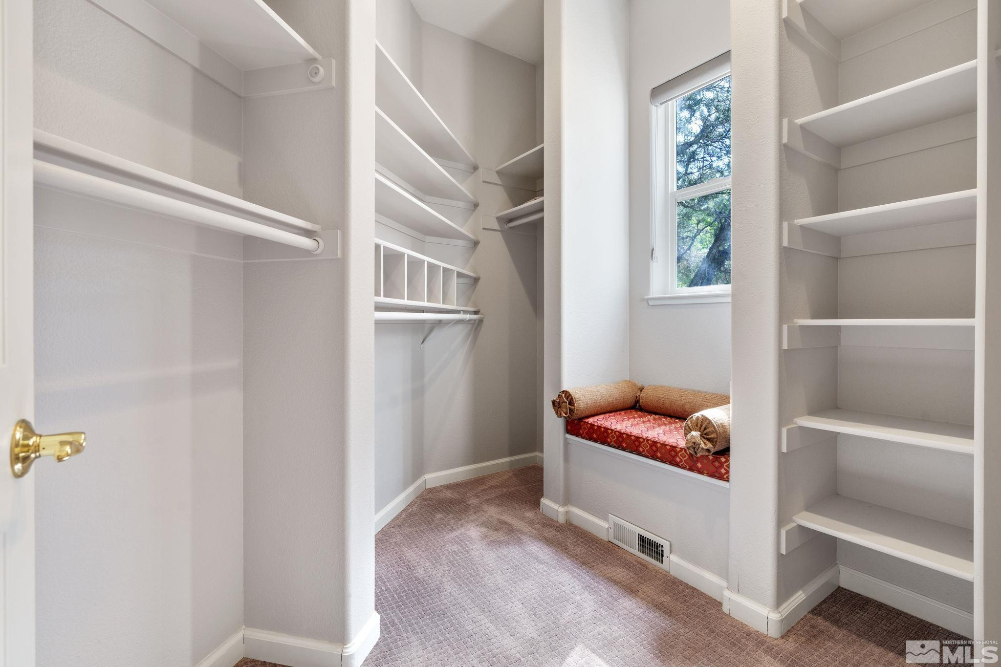 3950 Plateau Road Reno, NV 89519 - Photo 25 of 37 a bedroom with a bed and a window