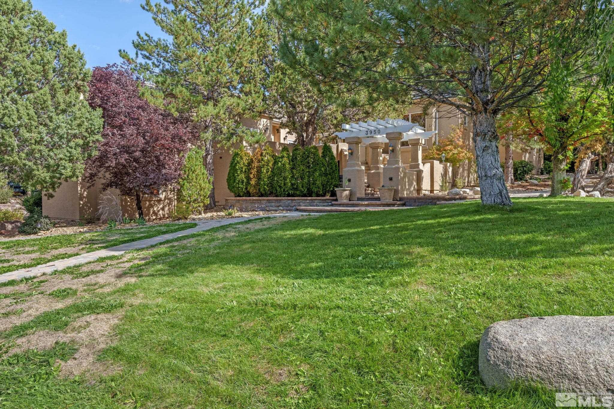 3950 Plateau Road Reno, NV 89519 - Photo 3 of 37 a view of a park with large trees