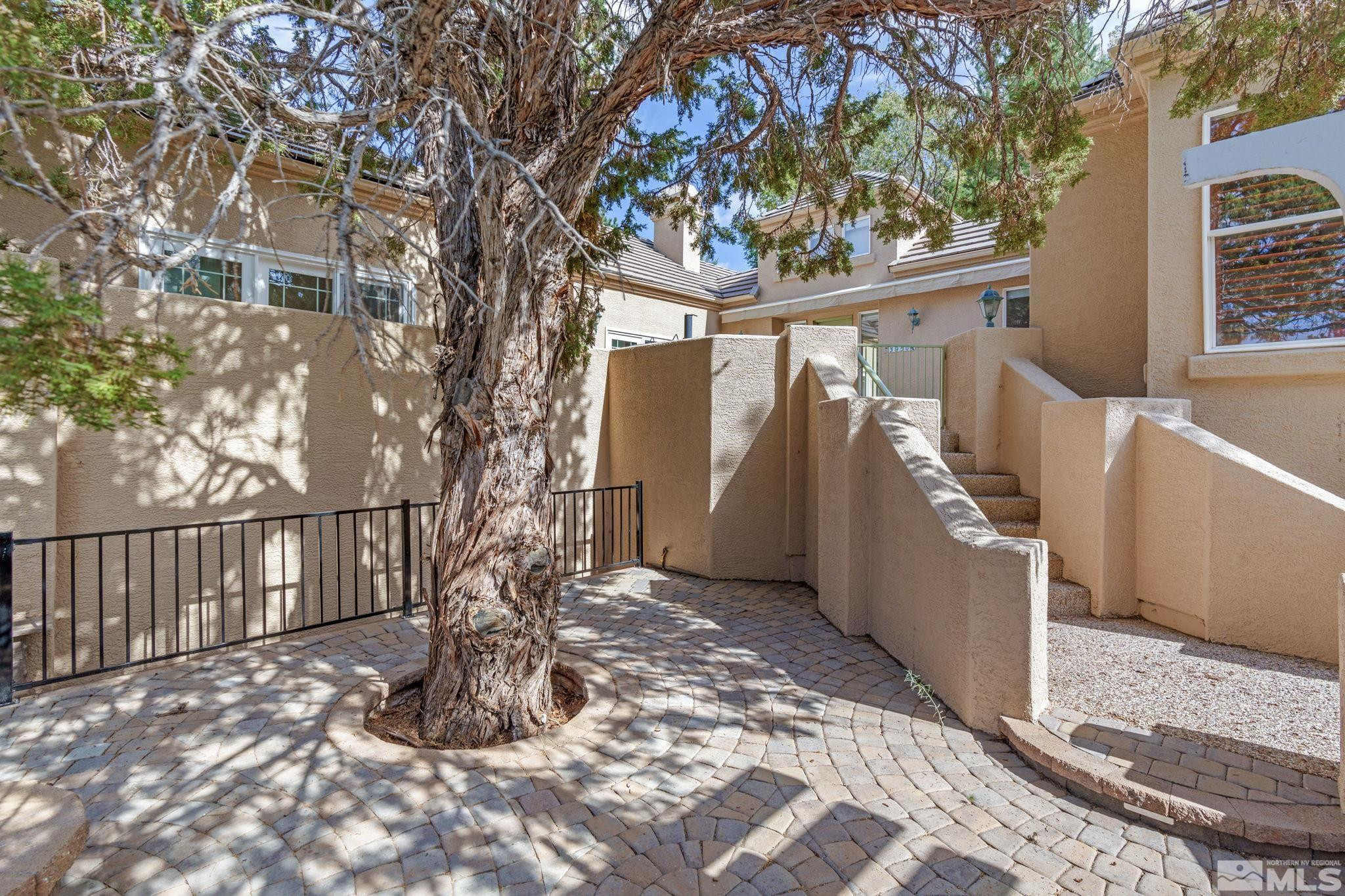 3950 Plateau Road Reno, NV 89519 - Photo 4 of 37 a view of a porch with a tree