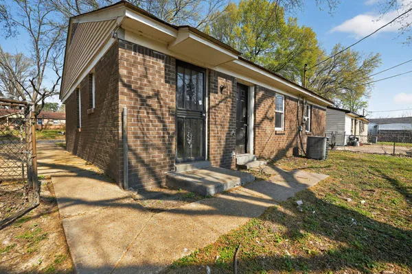 a view of a house with a patio