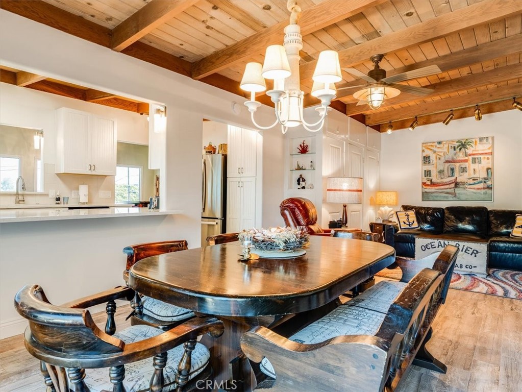 430 Olive Street Morro Bay, CA 93442 - Photo 24 of 68 a dining room with furniture and wooden floor