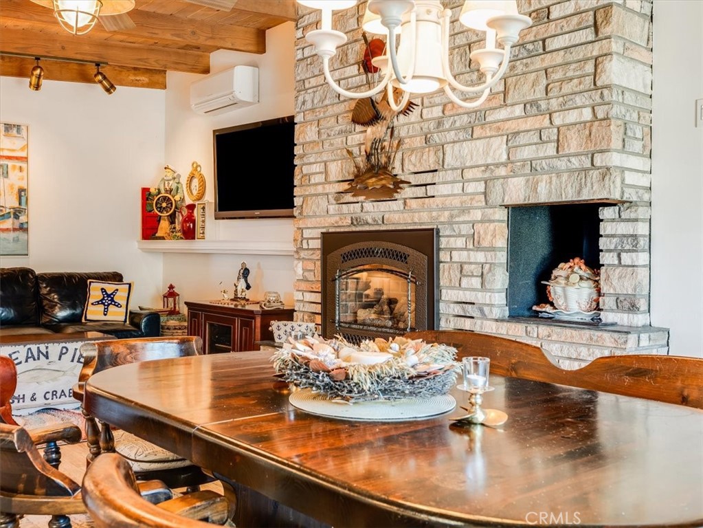 430 Olive Street Morro Bay, CA 93442 - Photo 25 of 68 a living room with fireplace furniture and a fireplace