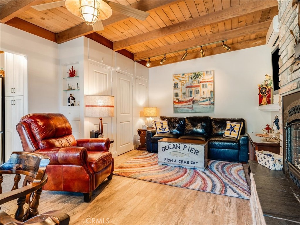 430 Olive Street Morro Bay, CA 93442 - Photo 27 of 68 a living room with furniture and wooden floor