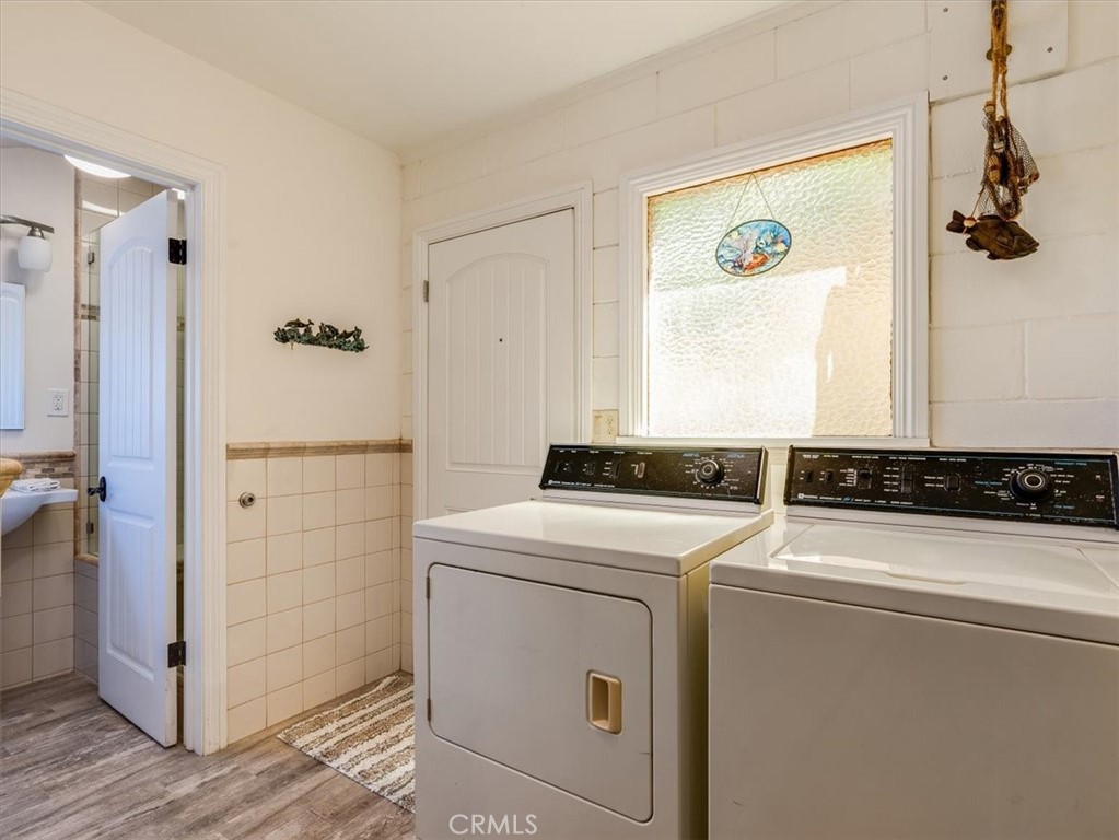 430 Olive Street Morro Bay, CA 93442 - Photo 44 of 68 a utility room with dryer and washer