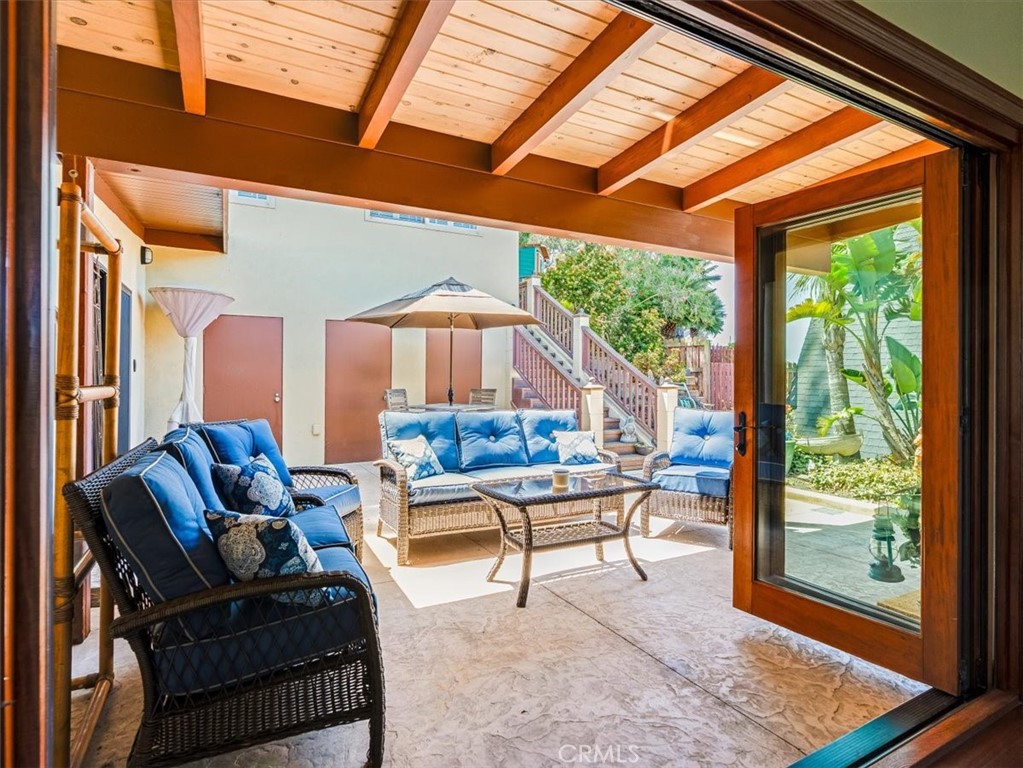 430 Olive Street Morro Bay, CA 93442 - Photo 51 of 68 a outdoor living space with furniture and a rug